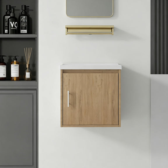 Wall-mounted bathroom vanity cabinet in light wood with white sink and single door