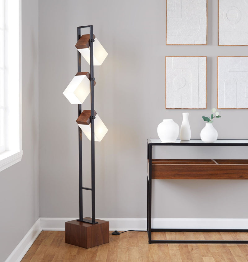Tall black floor lamp with stacked white cube shades and walnut square base