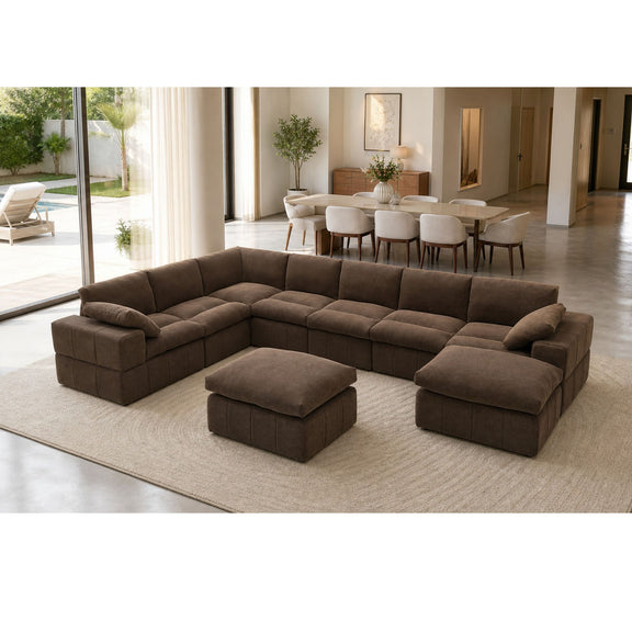 Dark brown sectional sofa with two ottomans and toss pillows