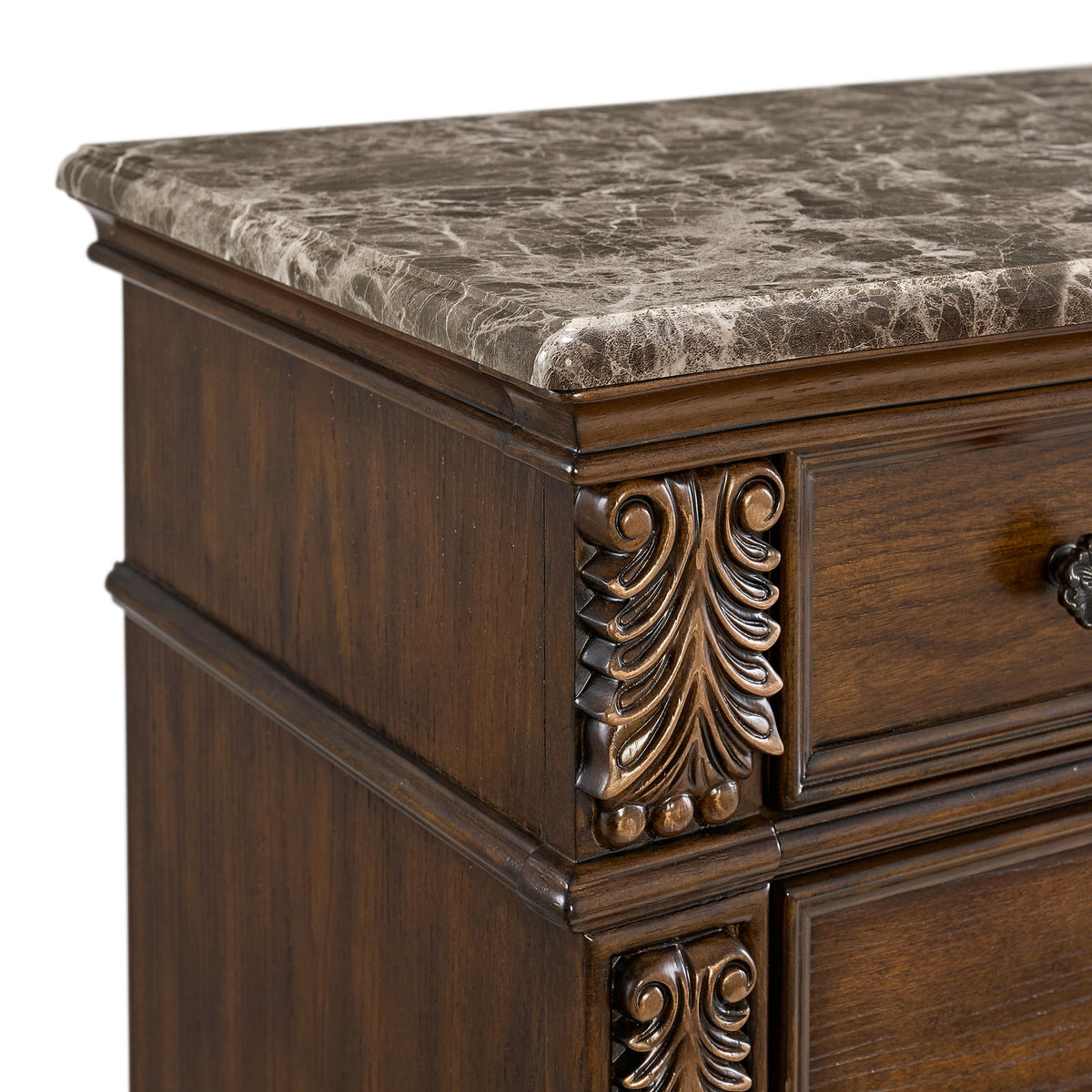 Brown wooden chest with ornate metal leaf corner details and textured top