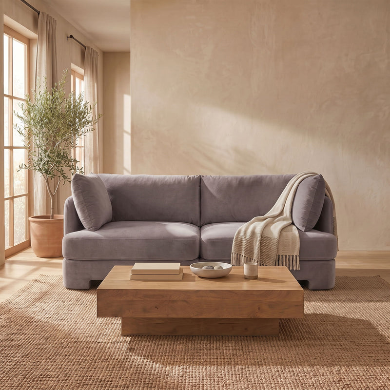 Light gray velvet upholstered 2-piece loveseat with two seat sections and bolster pillows