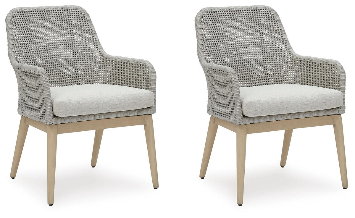 Pair of gray woven armchairs with padded seat cushions and light wood legs