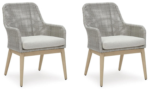 Pair of gray woven armchairs with padded seat cushions and light wood legs