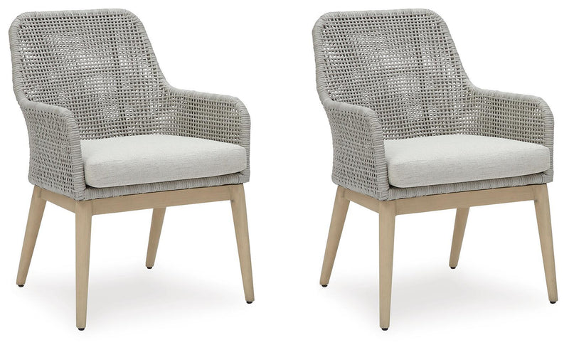 Pair of gray woven armchairs with padded seat cushions and light wood legs