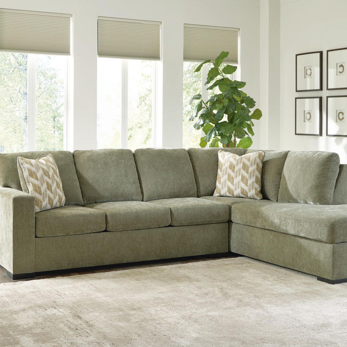 Green sleeper sectional sofa with corner chaise and ottoman seating