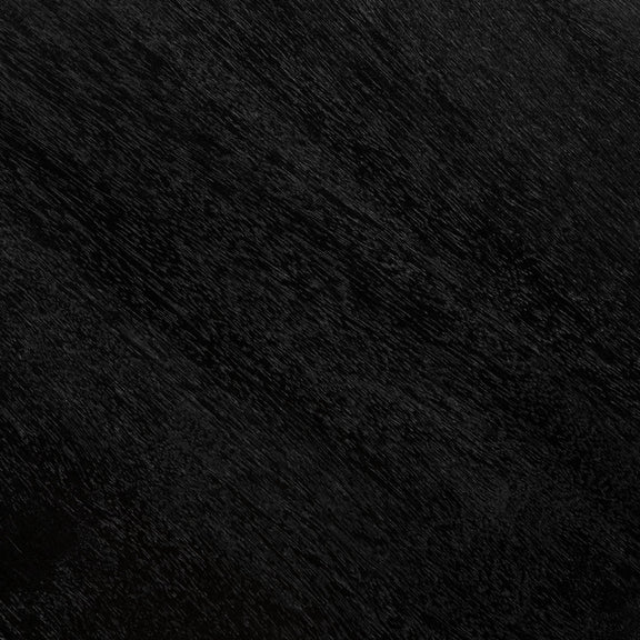 Dark tabletop surface close-up with textured wood-grain finish
