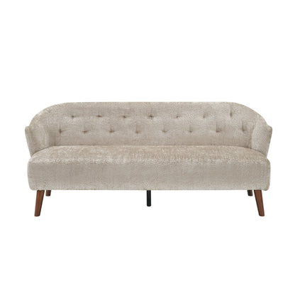 Light gray tufted upholstered 3-seater couch with curved arms and tapered legs