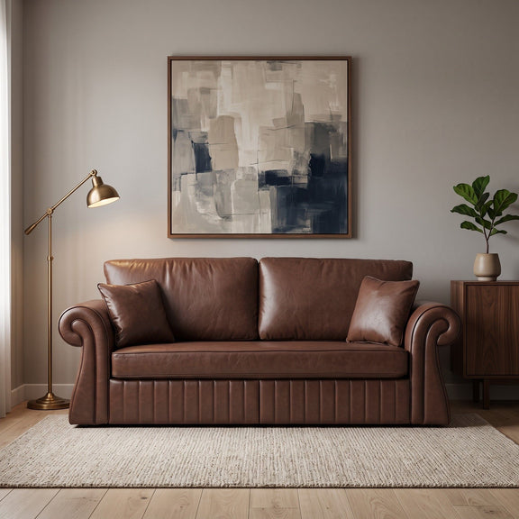 Dark brown three-seat sofa with rolled arms and two pillows, shown in a living room
