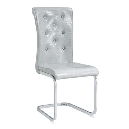 Upholstered dining chair in pearl silver with diamond tufting and stud buttons
