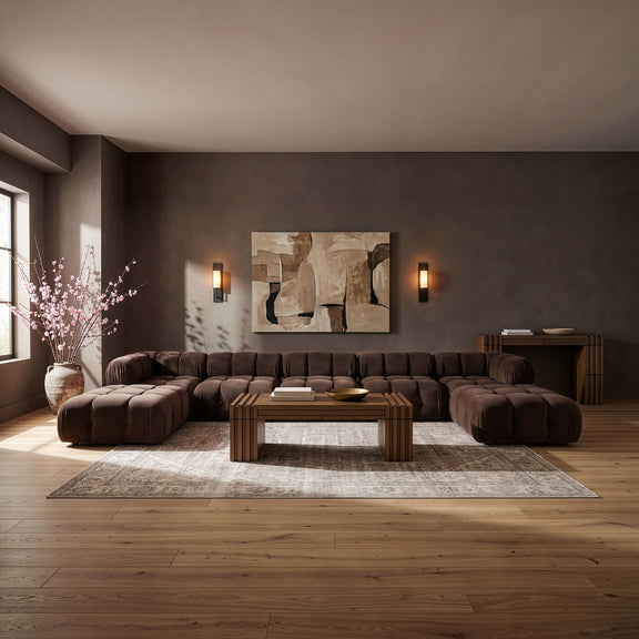 Dark brown modular sectional sofa with cushioned seats and rounded ottoman sections