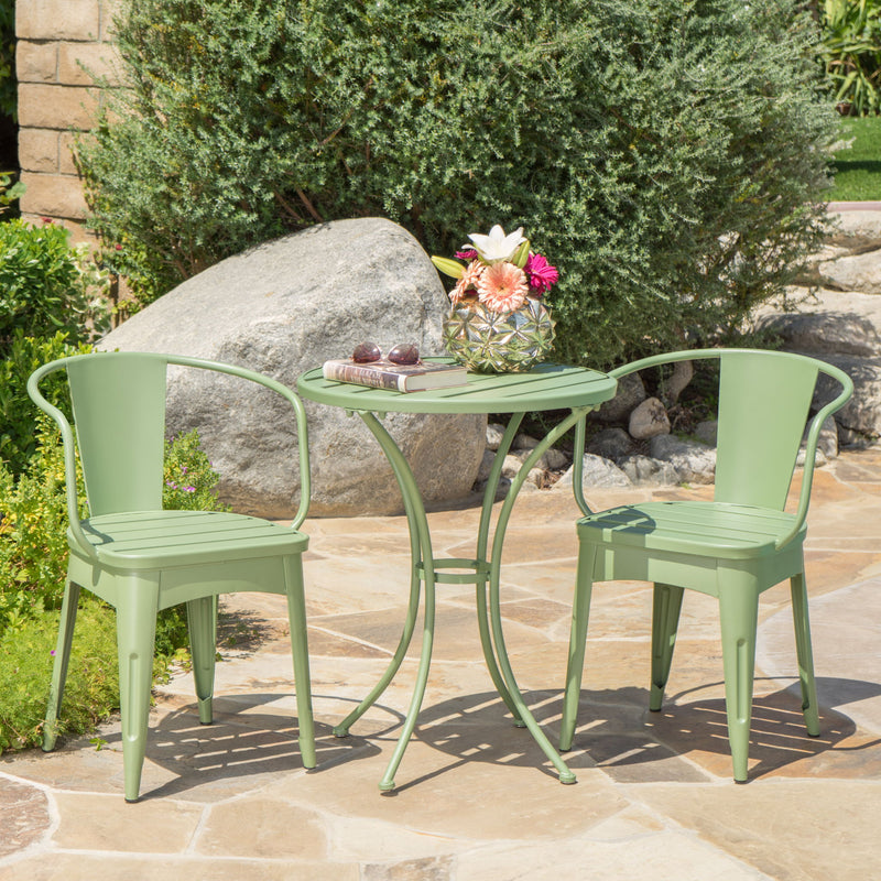 Green bistro set with table and two chairs, slatted tabletop and seat panels