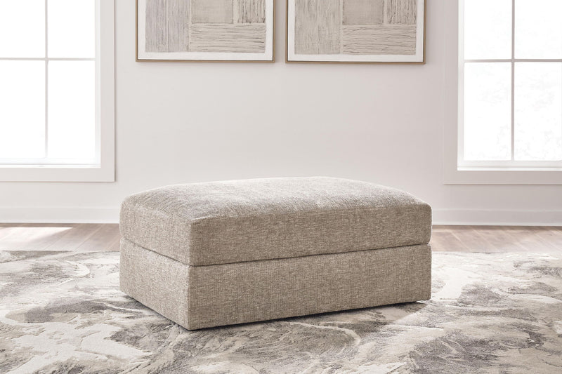 Oversized accent ottoman, light beige fabric with low rectangular padded profile
