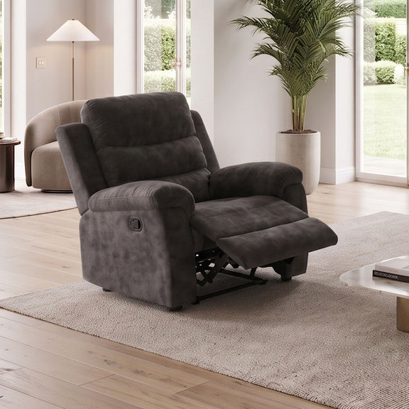 Dark gray manual recliner chair reclined with extended footrest and supportive back