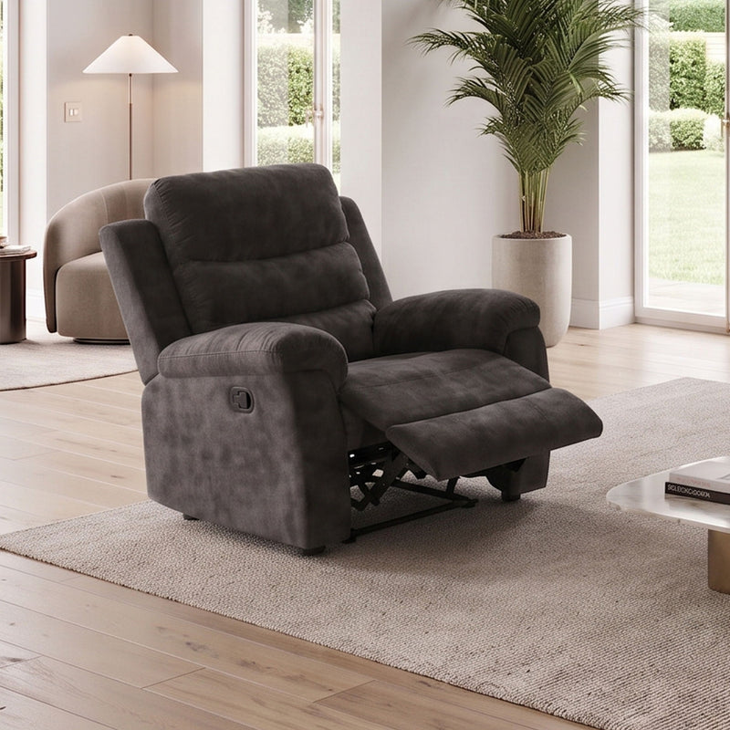 Dark gray manual recliner chair reclined with extended footrest and supportive back