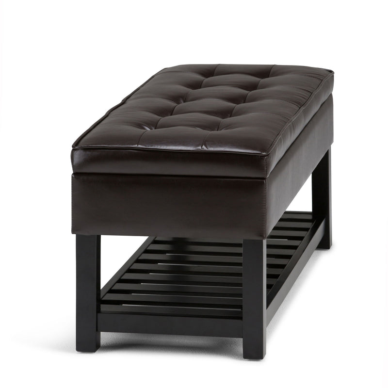 Brown storage ottoman bench with tufted top and open bottom slat base