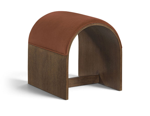 Rust velvet upholstered bench with arched back and dark wood base, open middle storage