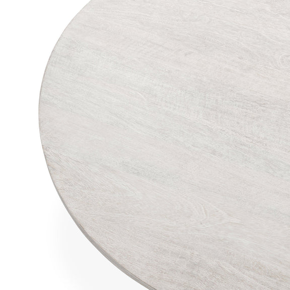 Creamwood round tabletop edge close-up with subtle wood grain