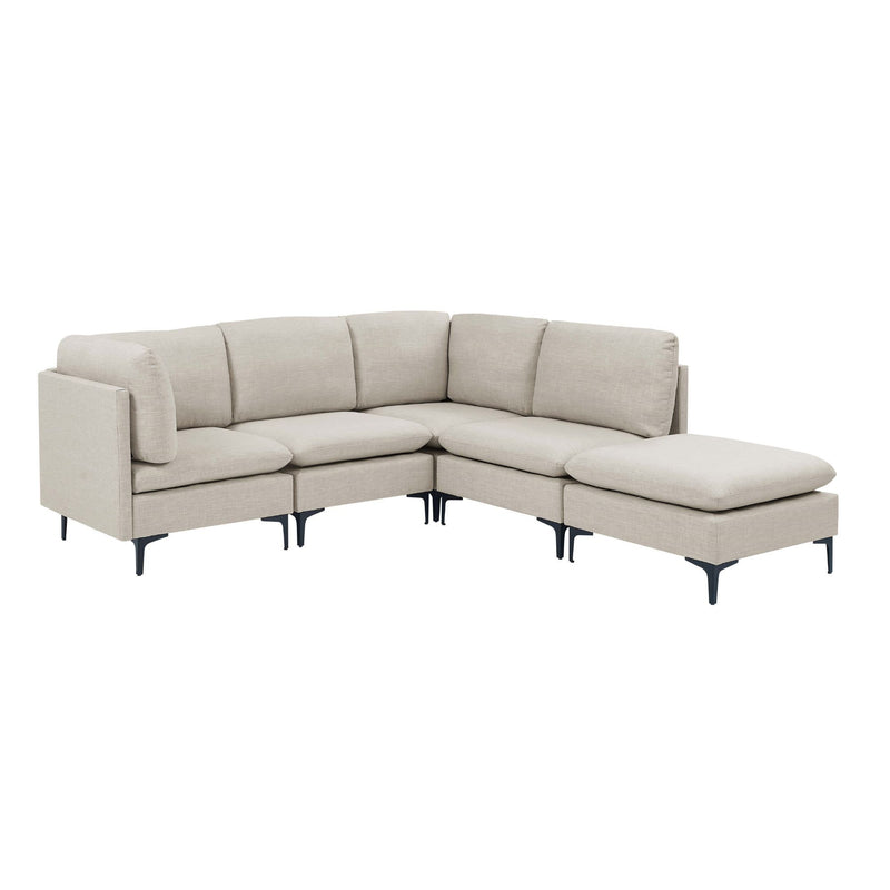 Beige L-shaped upholstered sectional with tall legs and two chaise ottoman cushions