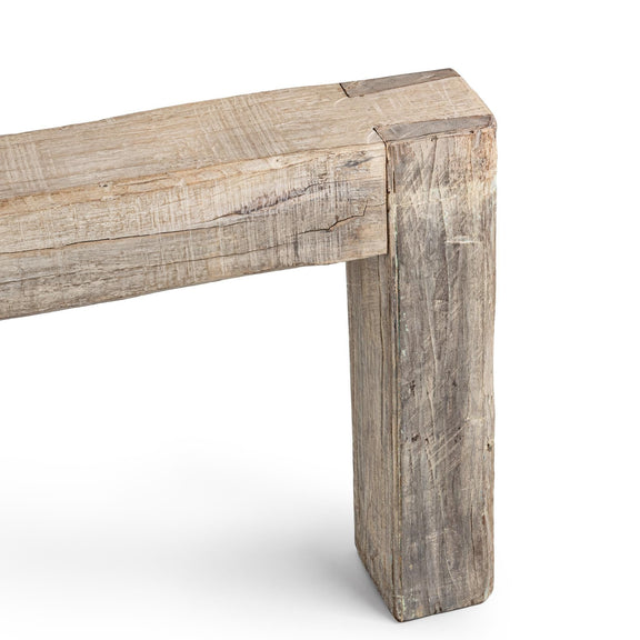 Console table corner detail with distressed wood top and vertical leg post