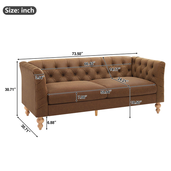 Light brown chesterfield-style sofa with tufted back, flared arms, and wooden legs