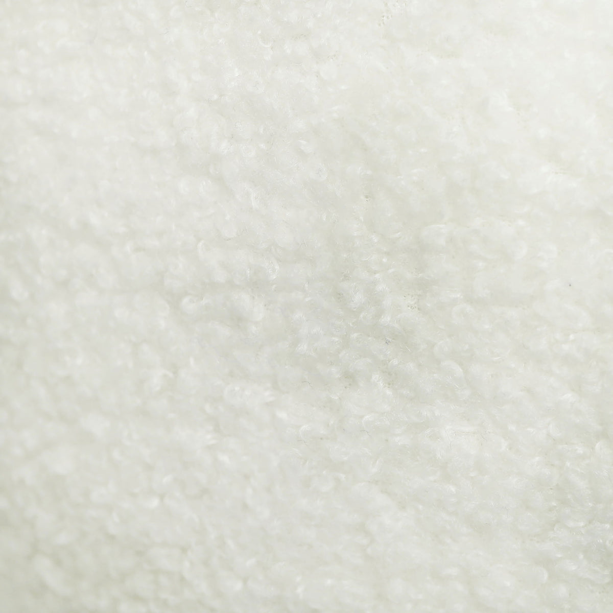 Beige faux shearling fabric close-up texture, soft plush nap