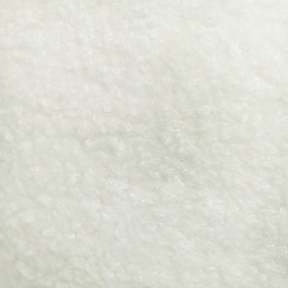Beige faux shearling fabric close-up texture, soft plush nap