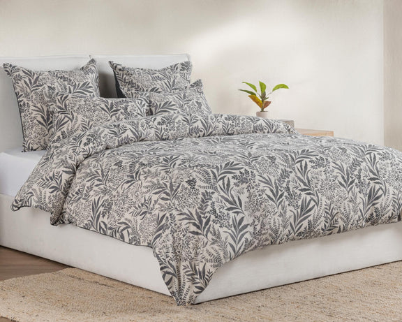 Denim blue leaf-pattern duvet set with multiple pillow shams