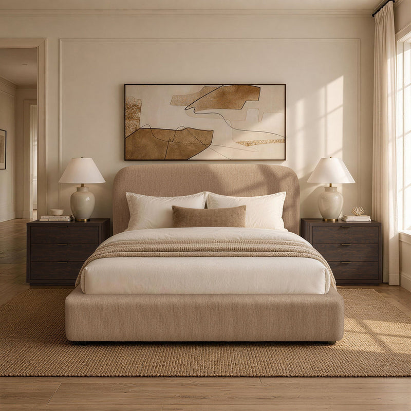 Light brown upholstered bed with rounded headboard and white bedding in room setting
