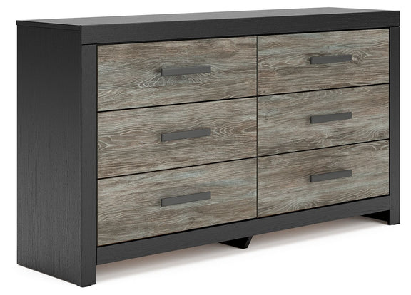 Black dresser with gray woodgrain drawer fronts and metal bar pulls