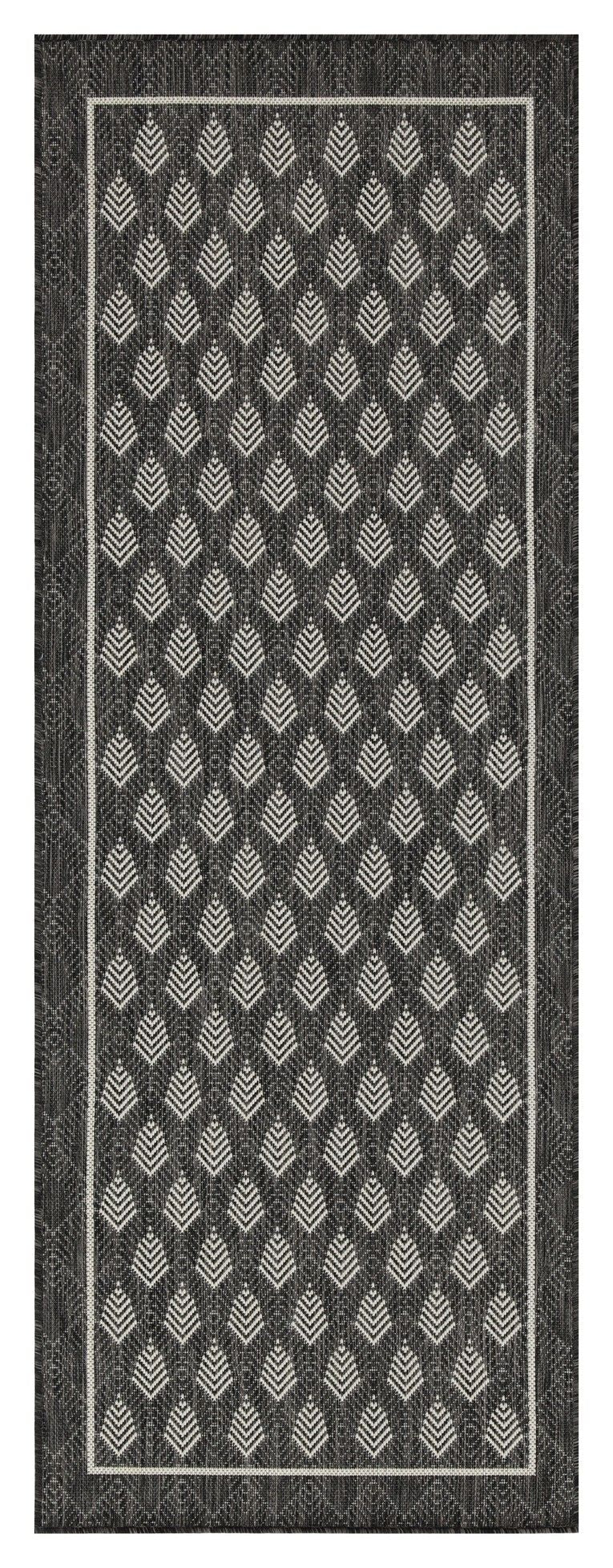 Dark gray indoor/outdoor area rug with repeating diamond pattern and light accents
