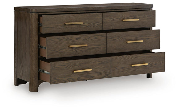 Dark brown wood dresser with three stacked drawers and gold bar pulls