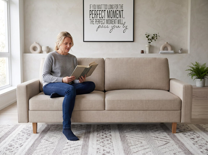 Beige two-seat loveseat with removable cushions and straight arms