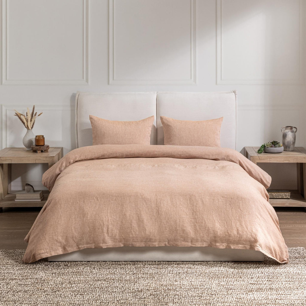 Linen-cashmere shams in light clay on a bed, rectangular with knife-edge seams
