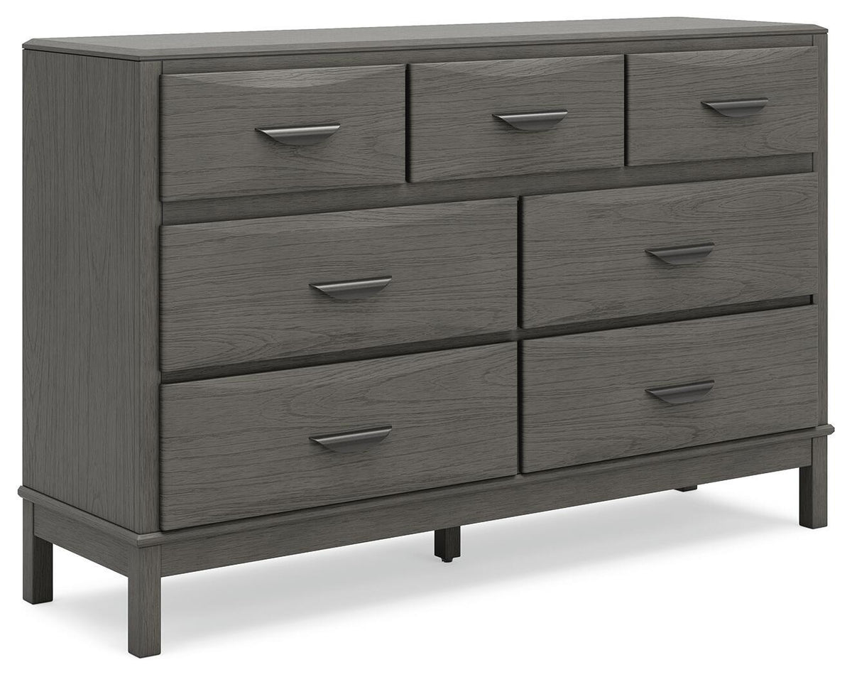 Gray dresser with eight drawers and metal bar handles