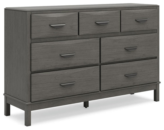 Gray dresser with eight drawers and metal bar handles