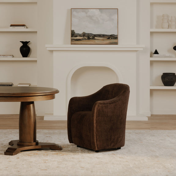 Dark brown upholstered rolling dining chair with curved back and caster base