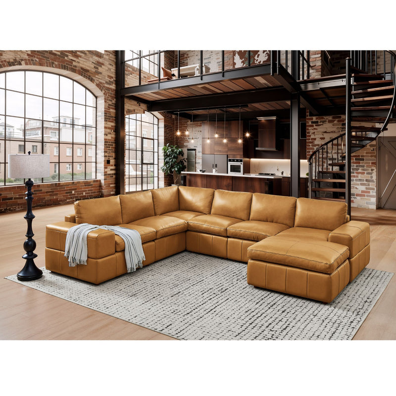 Light brown modular sectional sofa with chaise and bench-style ottoman in living room
