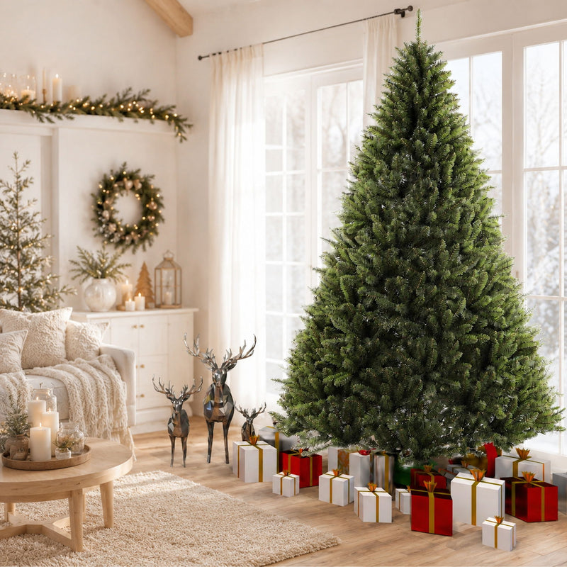 Dark green artificial Christmas tree with dense branch tips, full height on metal stand