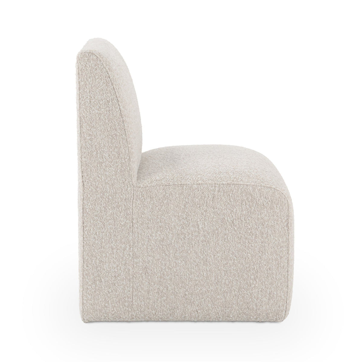 Upholstered dining chair in light beige fabric, close side view of arm and back