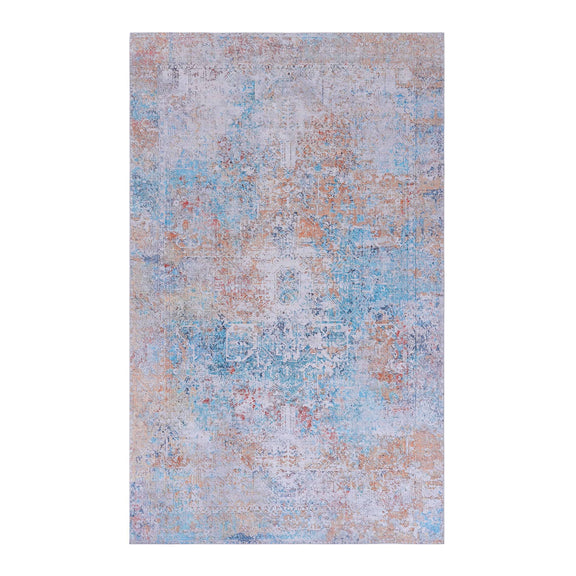 Washable area rug panel with light blue distressed mosaic texture and faded orange