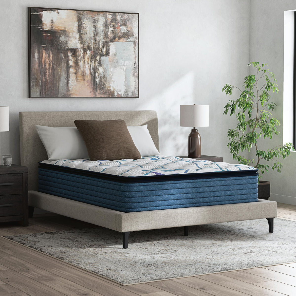 Limited edition plush PT 3.0 mattress with white cover and blue leaf pattern, teal edges