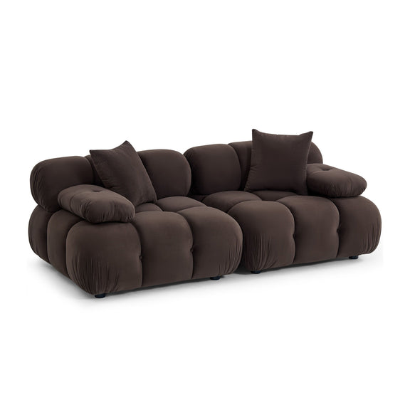 Brown modular loveseat with deep seats, rounded arms, and three back cushions on one base