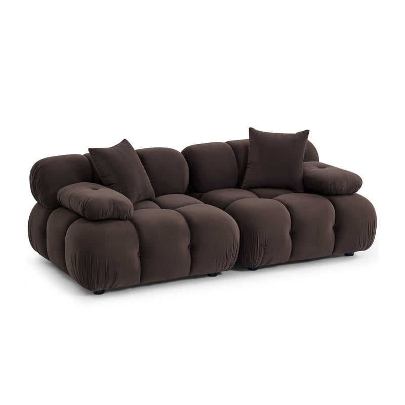 Brown modular loveseat with deep seats, rounded arms, and three back cushions on one base