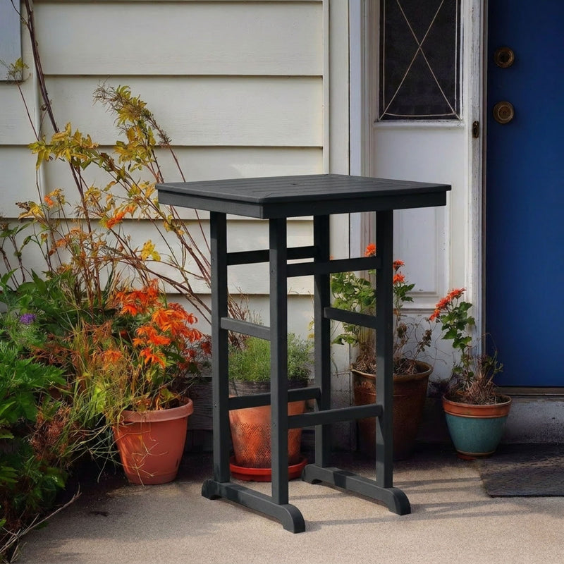 Outdoor bar table in dark gray with square tabletop and slatted side panels