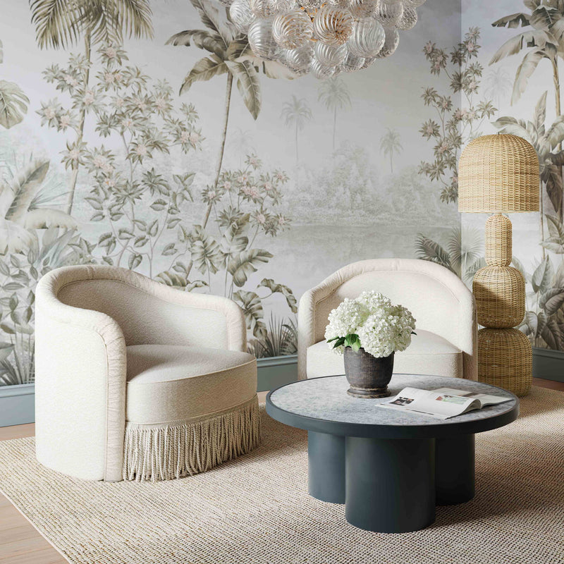 Natural rattan floor lamp with dome shade and three stacked woven sections