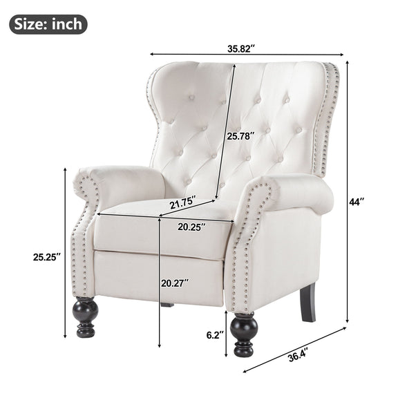 White tufted recliner chair with studded trim, padded arms, and dark ball feet.