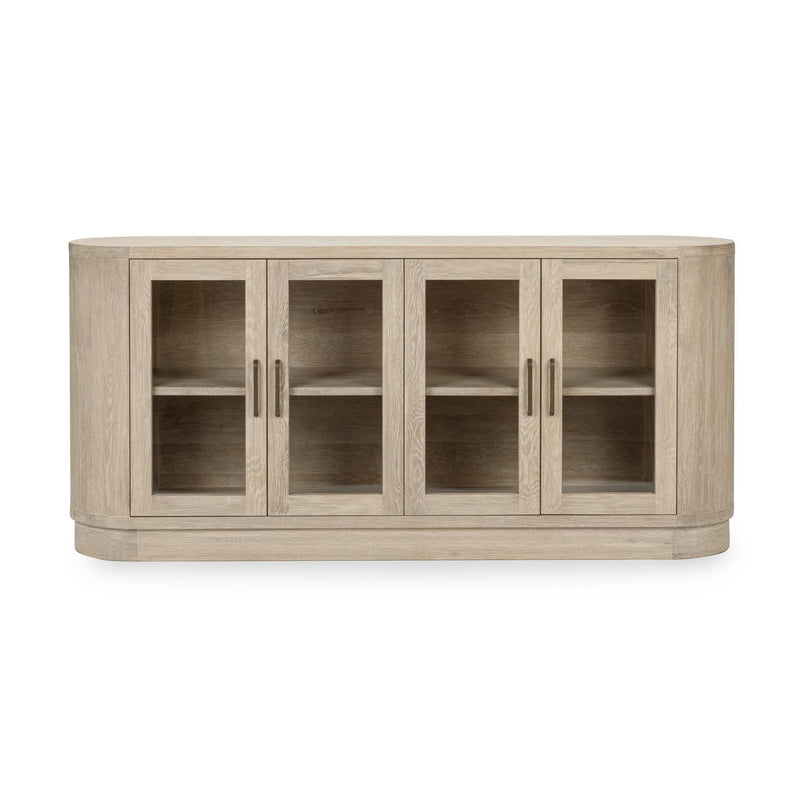 Cream washed 4-door buffet cabinet with glass-front doors and dark interior shelves