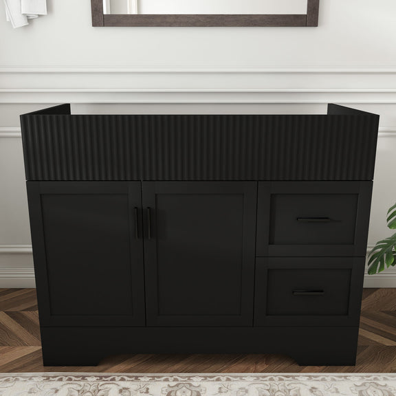 Black bathroom vanity with ribbed front, 2 doors and 2 drawers, bar handles