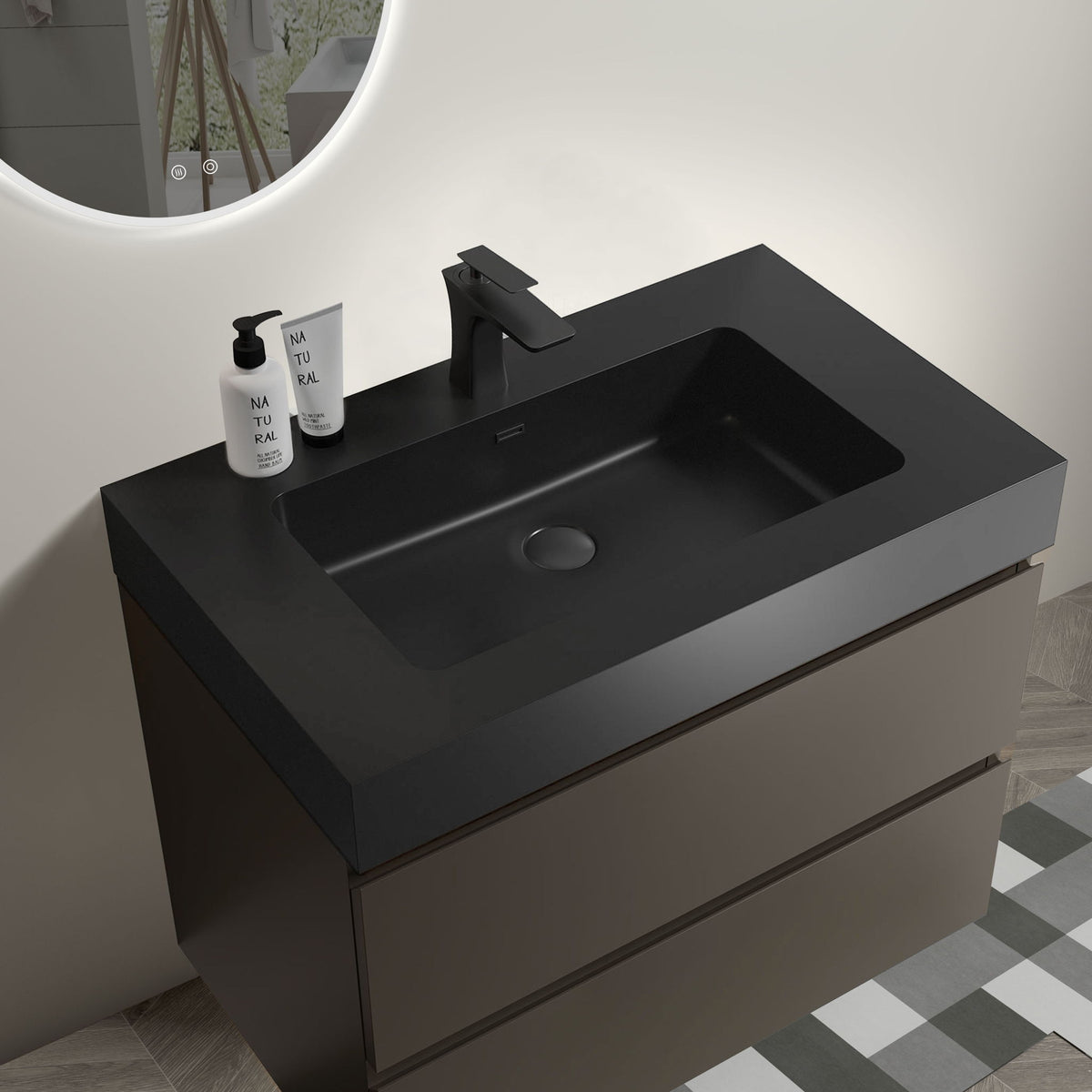 Black bathroom vanity with integrated sink and single-hole center drain, faucet included
