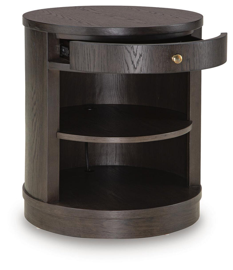 Dark brown round accent table with open drawer pulled out and curved open shelves